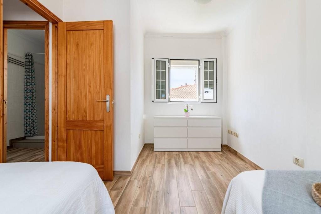 Łóżko lub łóżka w pokoju w obiekcie Villa Aspen Gran Canaria