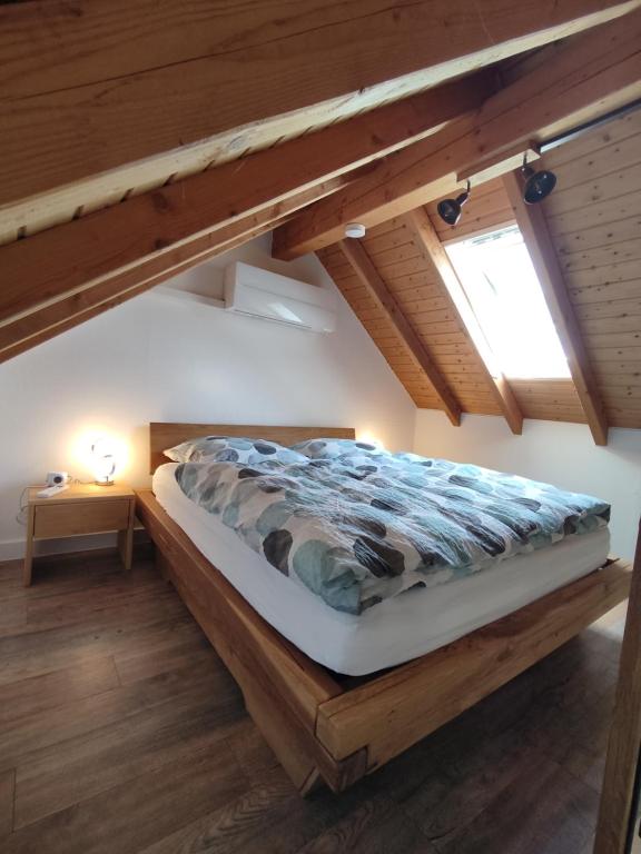 A bed or beds in a room at FeWo Antweiler Oberburg