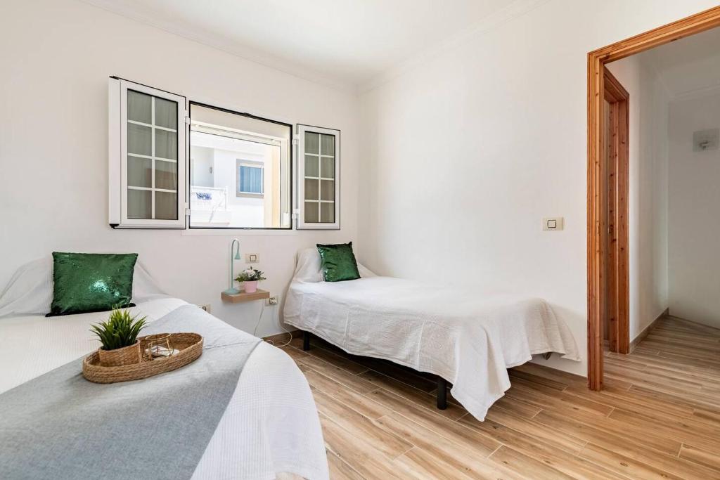 Łóżko lub łóżka w pokoju w obiekcie Villa Aspen Gran Canaria