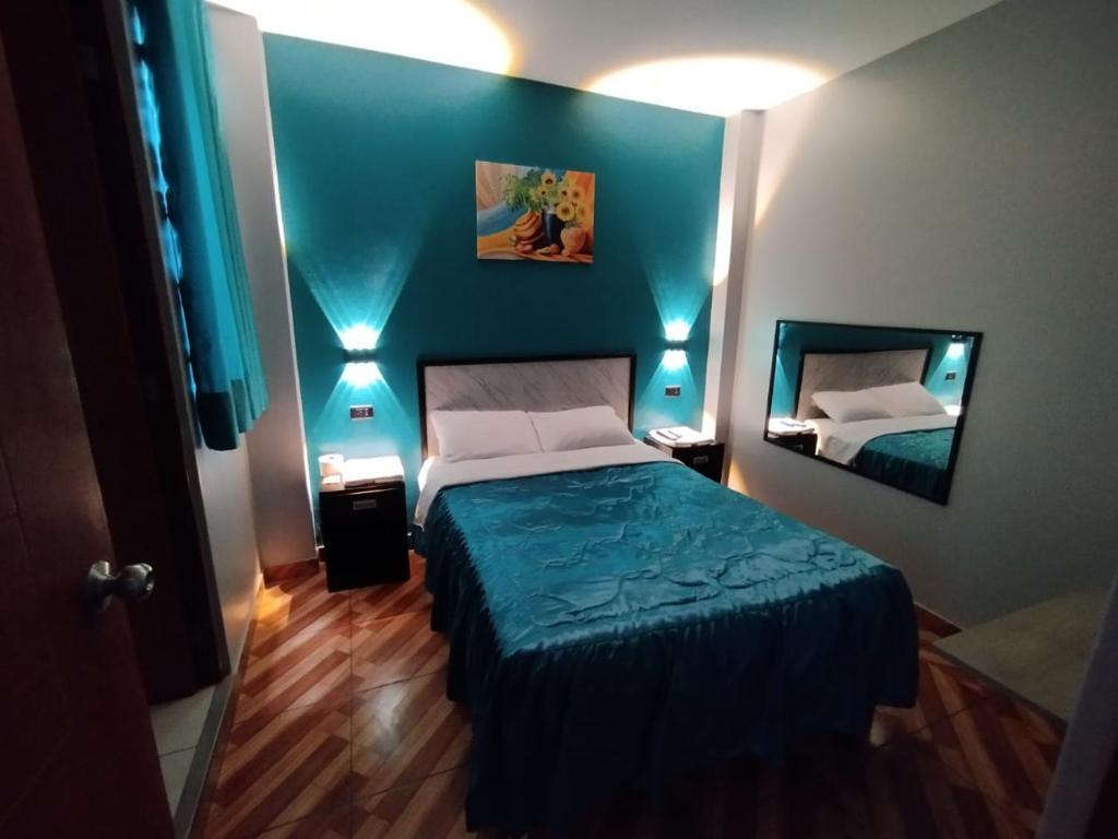 Postel nebo postele na pokoji v ubytování Hostal El Pilar