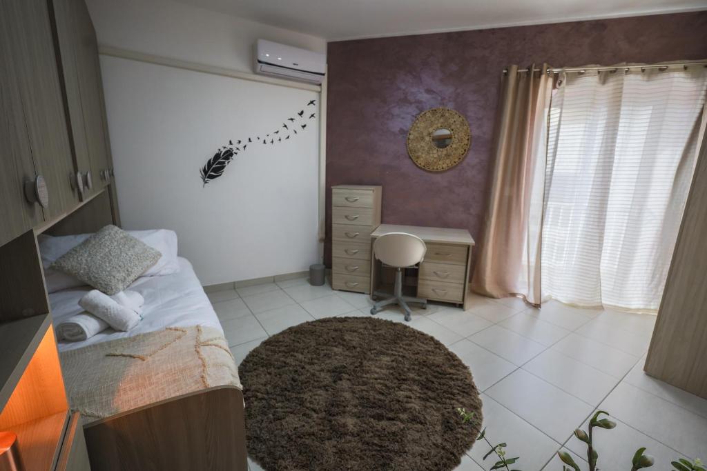 Postel nebo postele na pokoji v ubytování The Podium Apartment