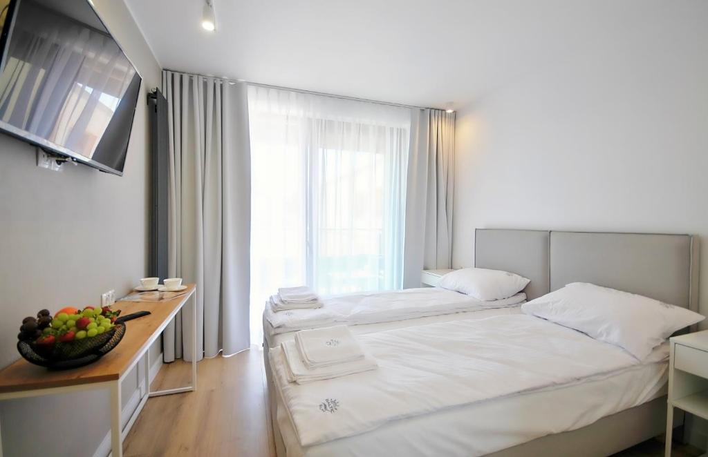Posteľ alebo postele v izbe v ubytovaní Hotel Baltic Sun
