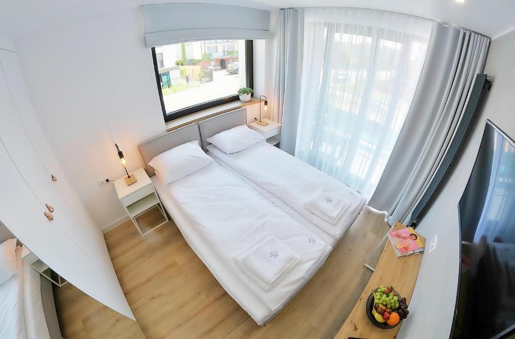 Posteľ alebo postele v izbe v ubytovaní Hotel Baltic Sun