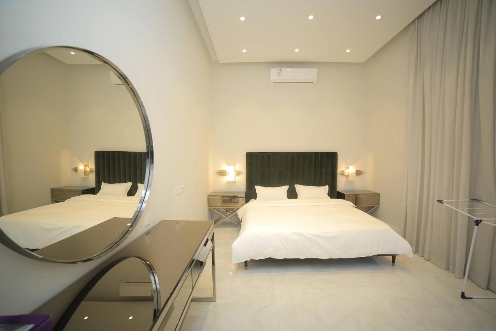 Ένα ή περισσότερα κρεβάτια σε δωμάτιο στο تان ڤيو - Tan view