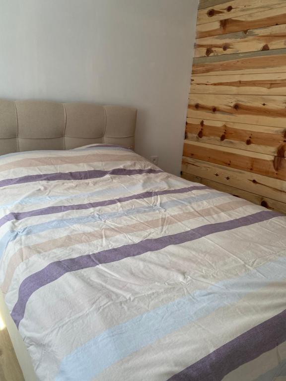 Postel nebo postele na pokoji v ubytování Tiny house Neny Fruška gora