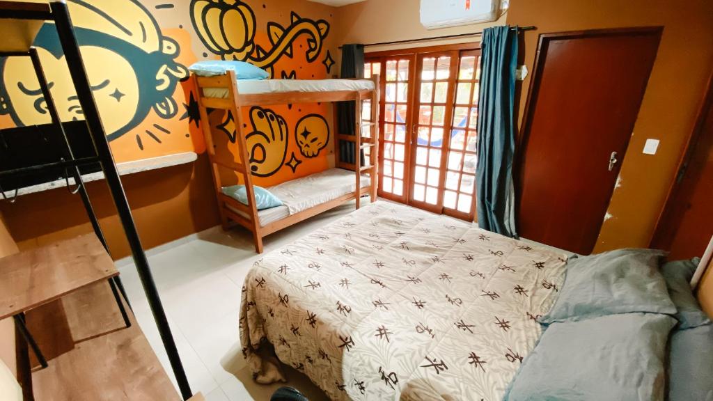Postel nebo postele na pokoji v ubytování Sagui Hostel