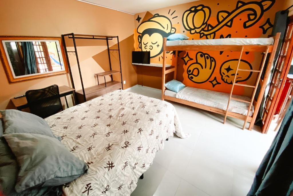 Postel nebo postele na pokoji v ubytování Sagui Hostel