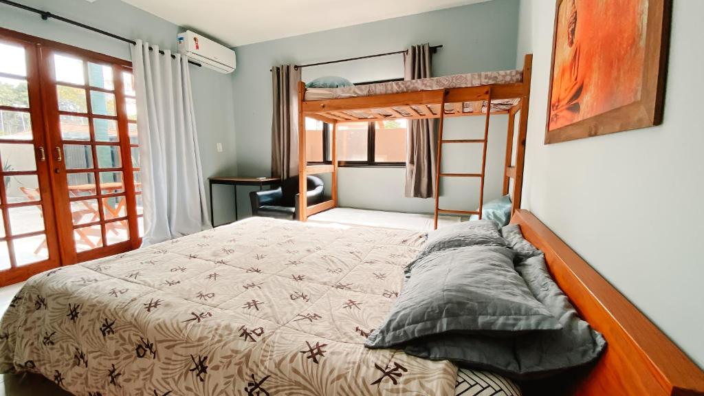 Postel nebo postele na pokoji v ubytování Sagui Hostel