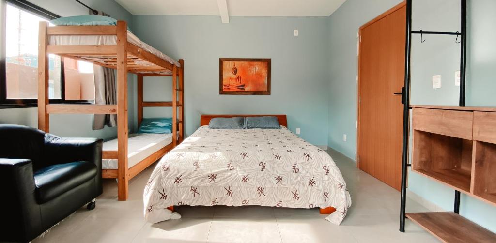 Postel nebo postele na pokoji v ubytování Sagui Hostel