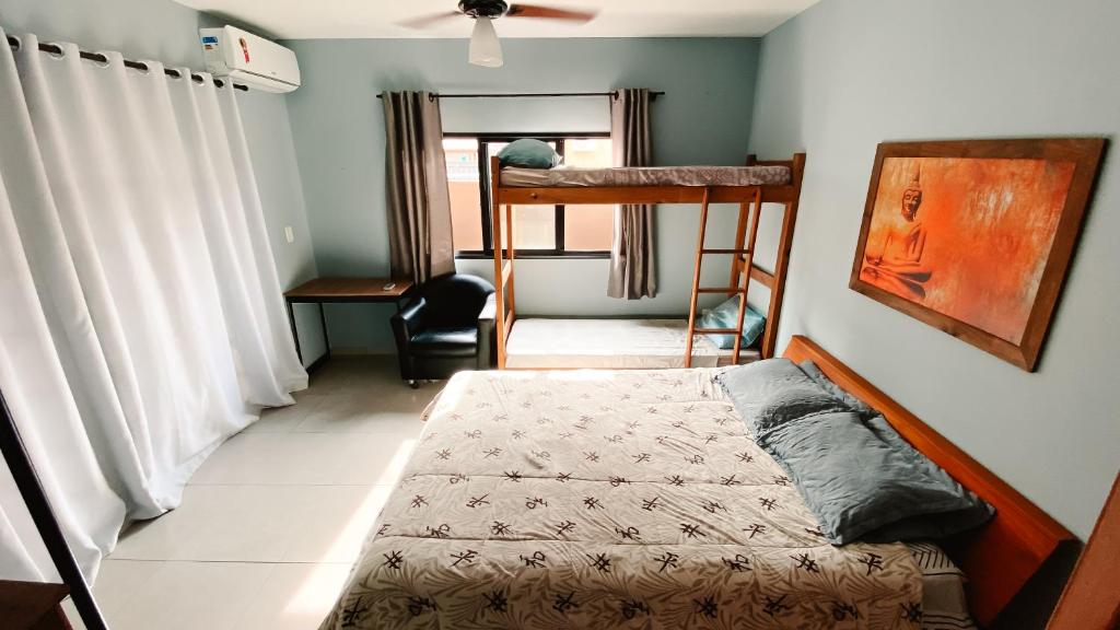 Postel nebo postele na pokoji v ubytování Sagui Hostel