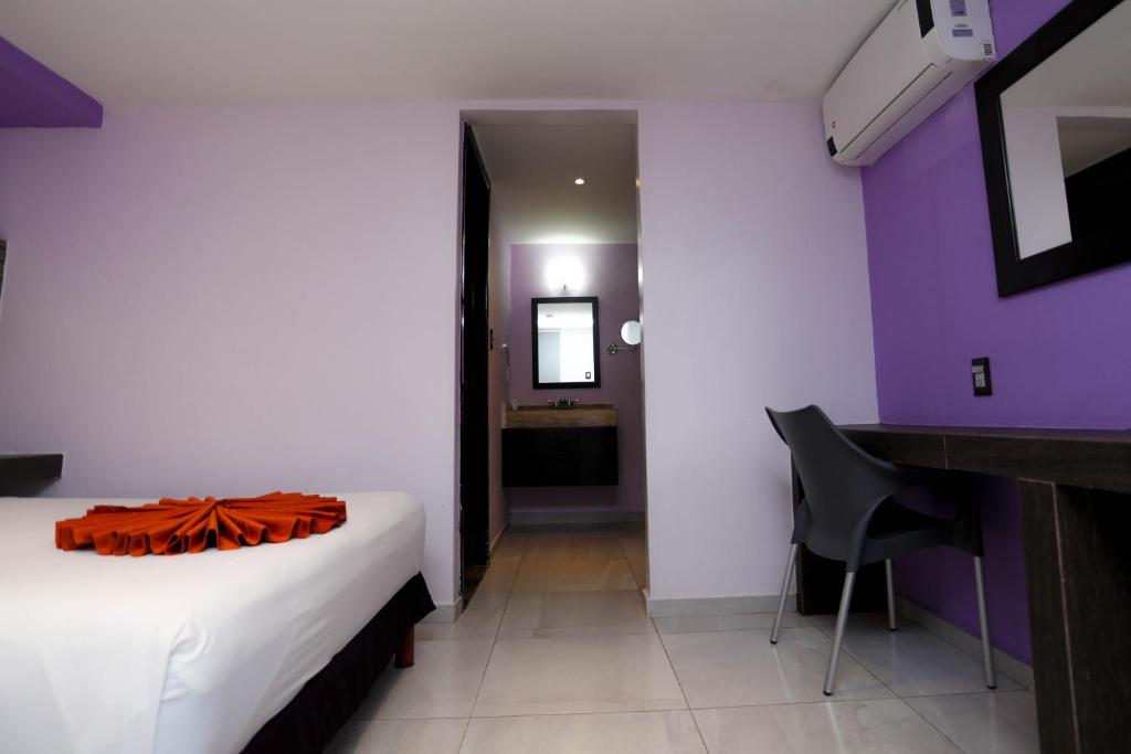 Postel nebo postele na pokoji v ubytování Hotel Kavia