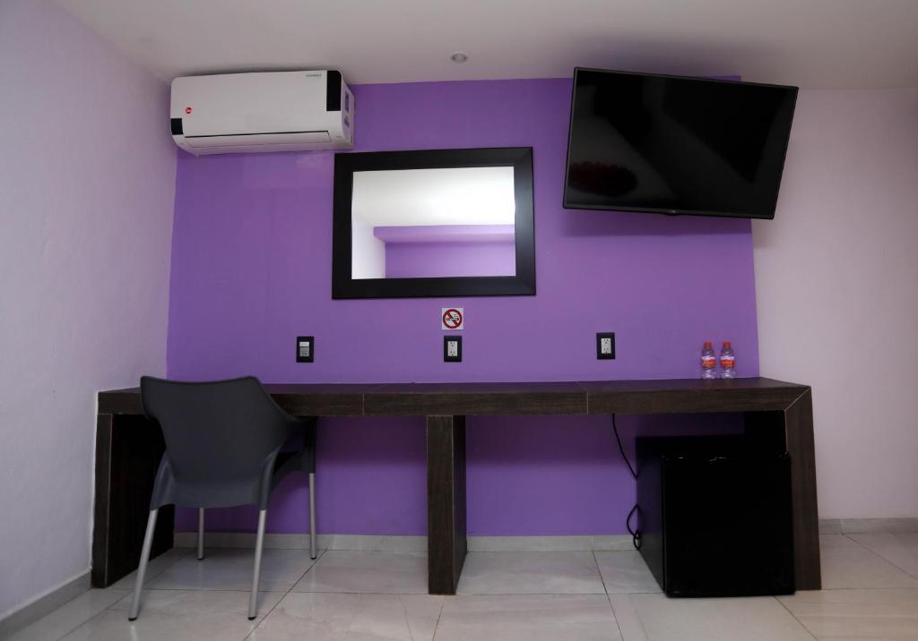 TV a/nebo společenská místnost v ubytování Hotel Kavia