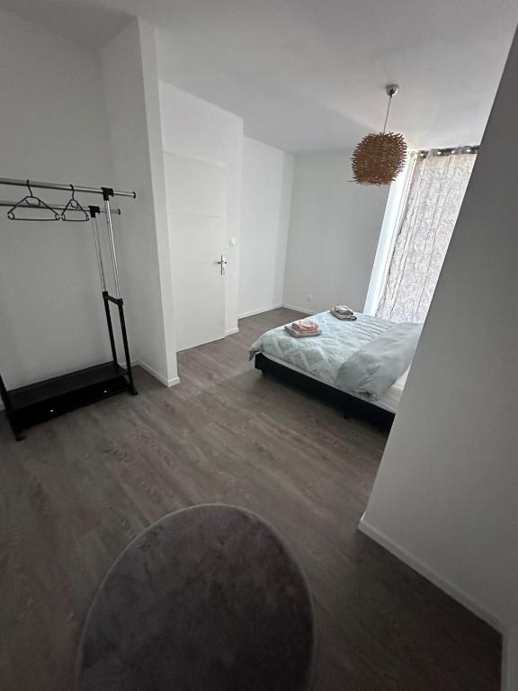 Posteľ alebo postele v izbe v ubytovaní La colmarienne