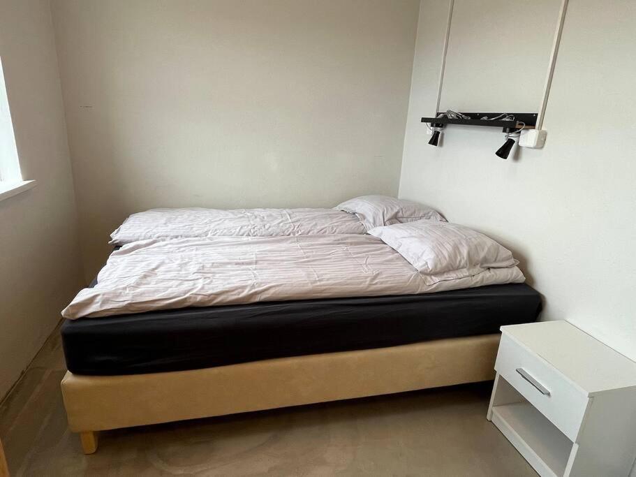 Ліжко або ліжка в номері Black Valley apartment