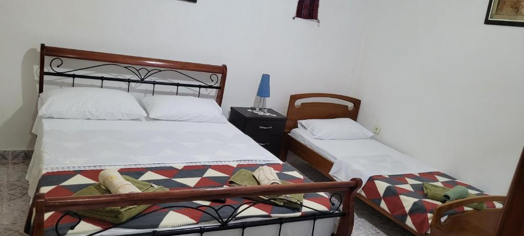 Postel nebo postele na pokoji v ubytování Guesthouse Reçka