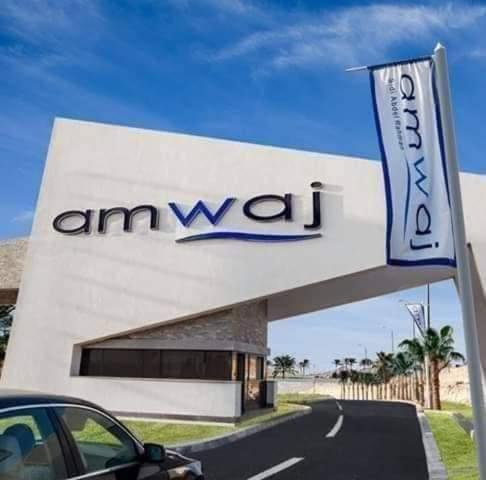 a amazon sign on the side of a building at AMWAj in El Alamein