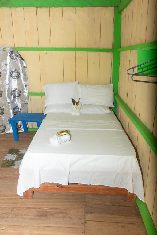 Postel nebo postele na pokoji v ubytování Cabaña Ecoturistica Villa Inesita