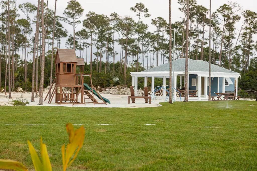a park with a playground and a pavilion with at Ruby’s Place in Nassau