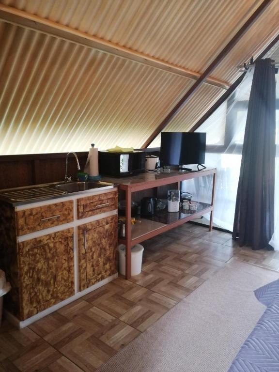 TV a/nebo společenská místnost v ubytování Villa Campo's