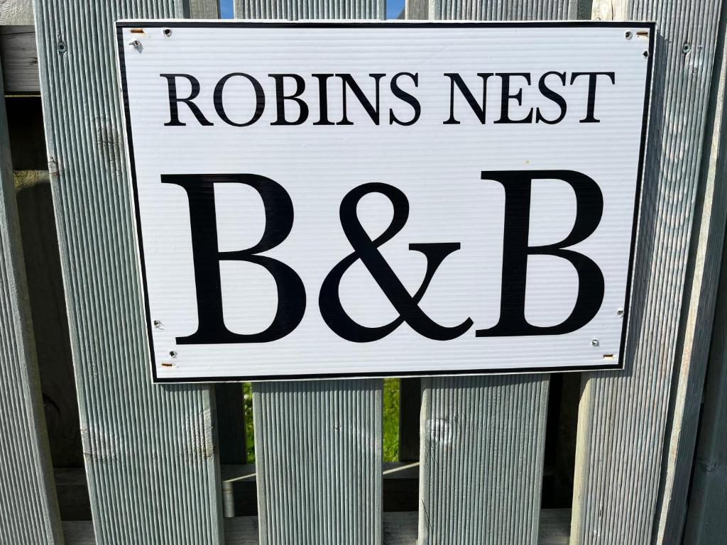 Certifikát, hodnocení, plakát nebo jiný dokument vystavený v ubytování Robins Nest
