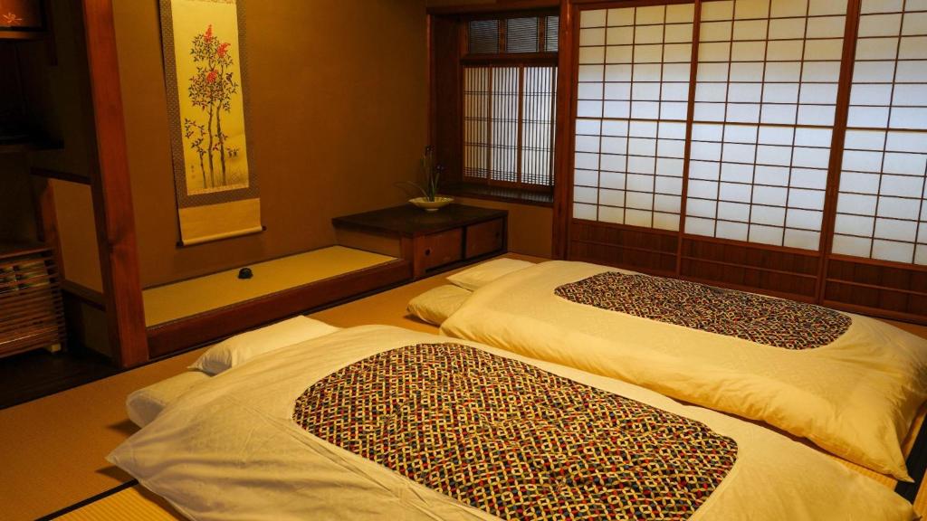 Lova arba lovos apgyvendinimo įstaigoje Ryokan Tsukie - Vacation STAY 05180v