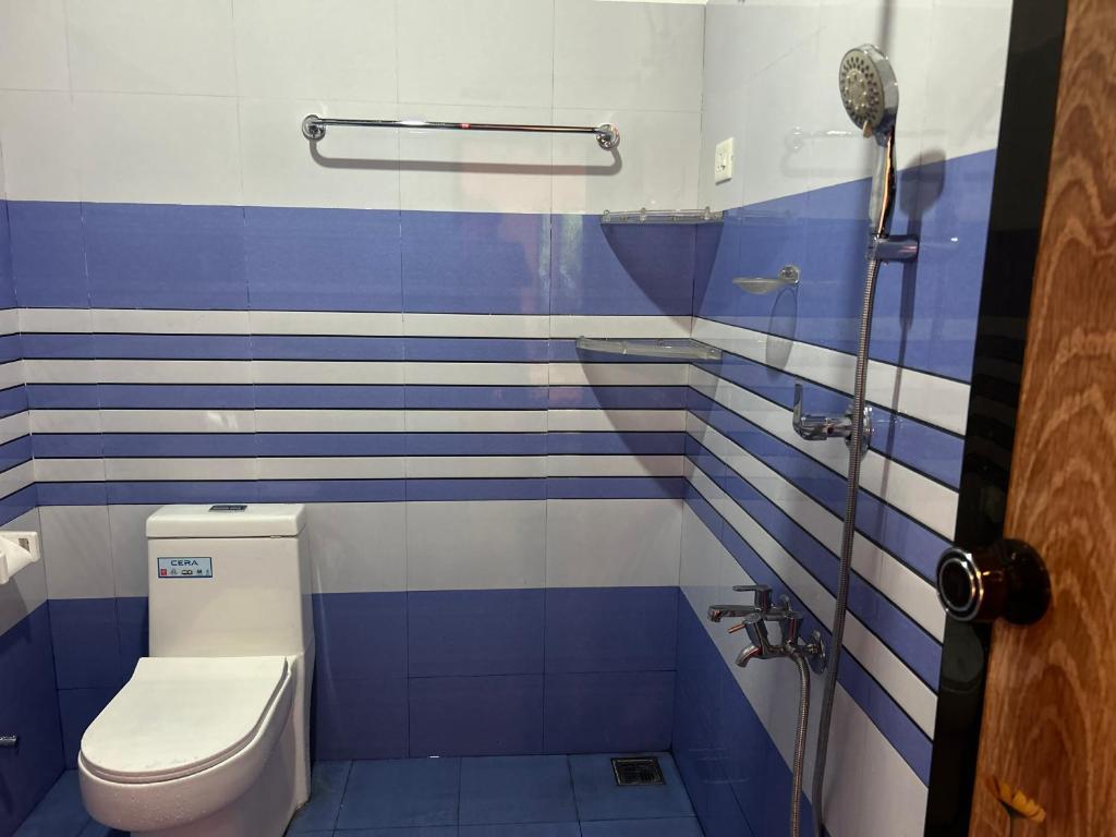 Koupelna v ubytování Marari Sabari Home Stay
