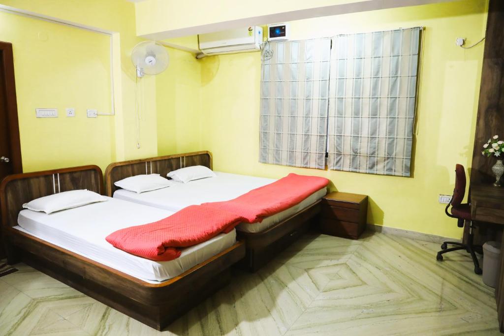 Postel nebo postele na pokoji v ubytování Sikaria Homes