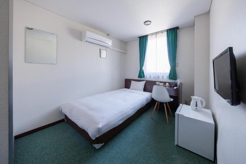 מיטה או מיטות בחדר ב-Hotel Nomad - Vacation STAY 71182v