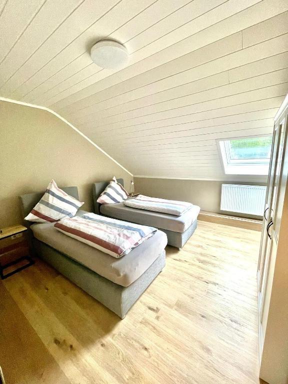 Postel nebo postele na pokoji v ubytování Ferienhaus Dobias