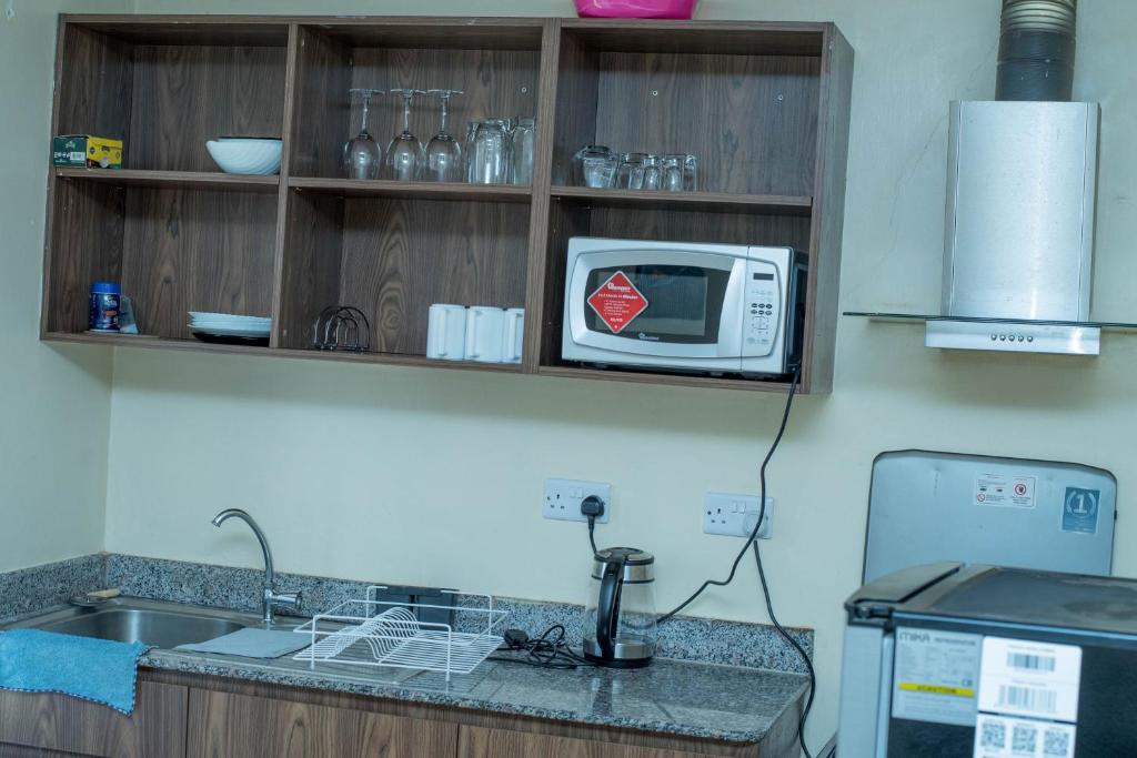 Köök või kööginurk majutusasutuses Eldoret home, Q10 unity homes