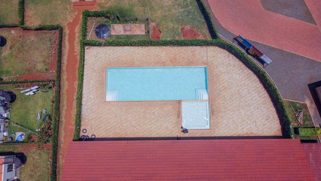 Bassein majutusasutuses Eldoret home, Q10 unity homes või selle lähedal