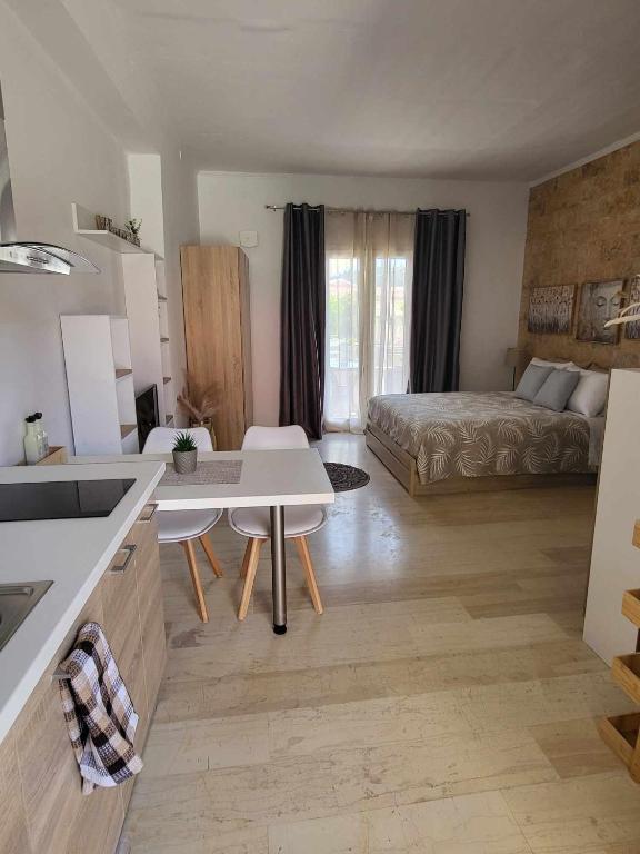 Postel nebo postele na pokoji v ubytování Cielo Studio & Apartments