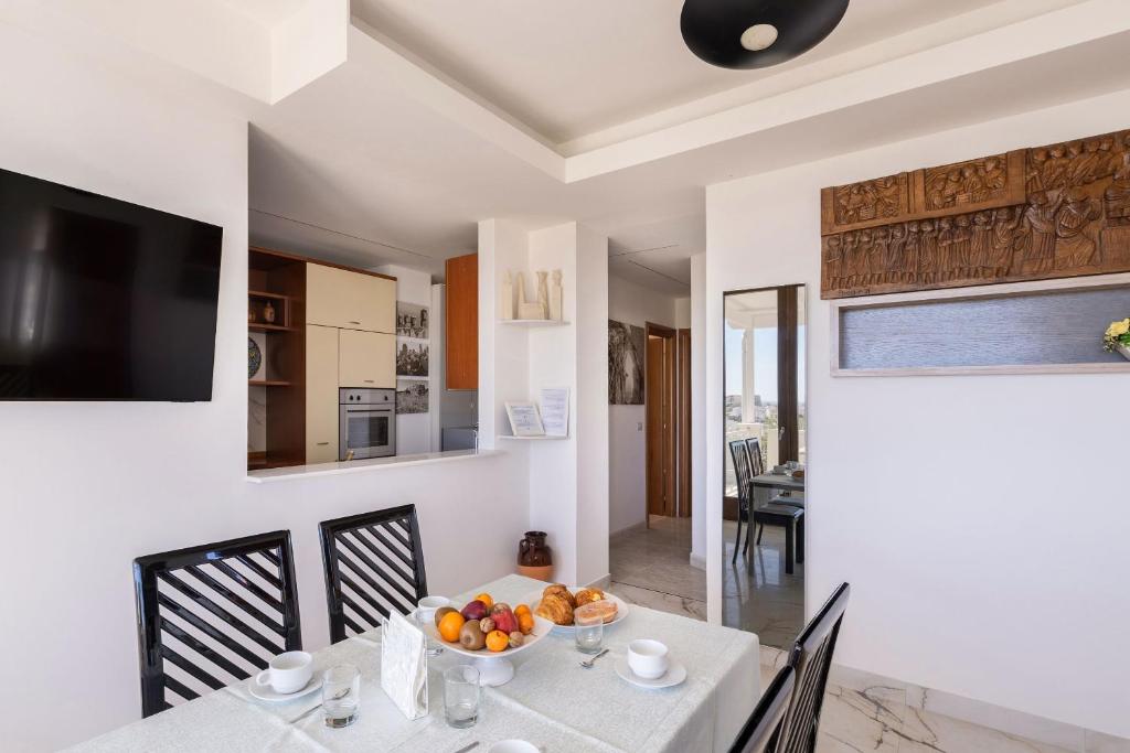 A kitchen or kitchenette at A Casa di Anna by BarbarHouse