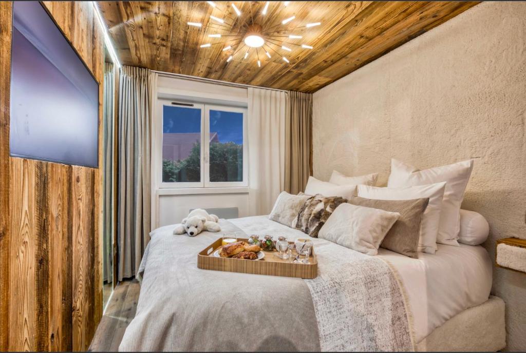Posteľ alebo postele v izbe v ubytovaní Le petit cœur de Megève -Mont770-