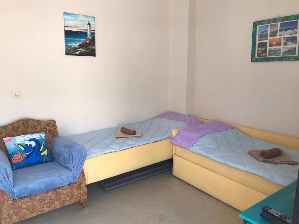 Postel nebo postele na pokoji v ubytování Loutraki Vacation