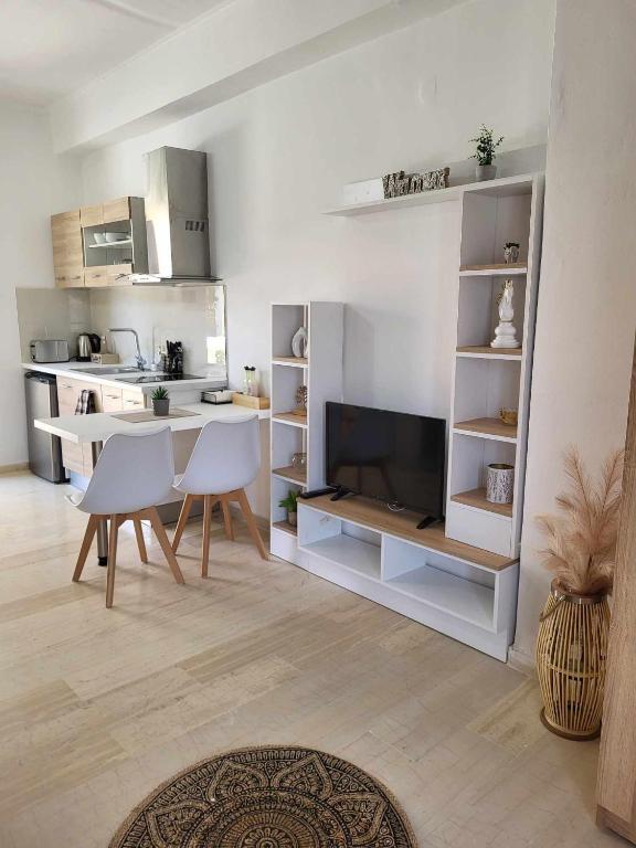 Kuchyň nebo kuchyňský kout v ubytování Cielo Studio & Apartments