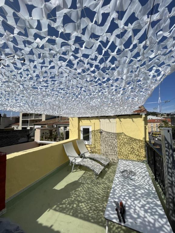 Photo de la galerie de l'établissement Triplex avec terrasse en rooftop, au coeur de Sete, à Sète