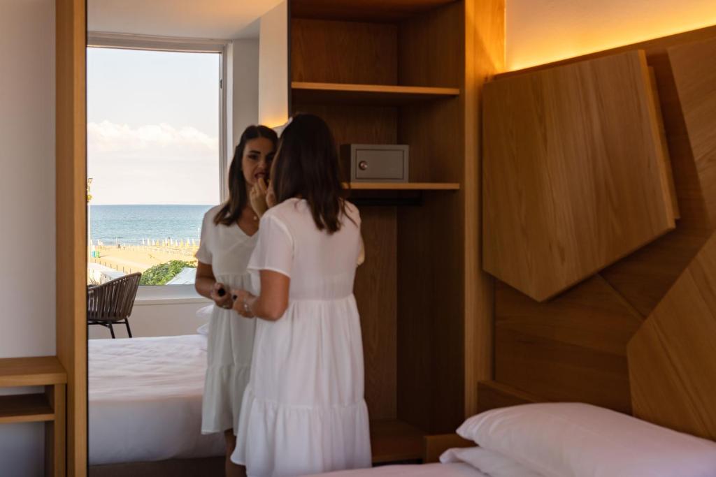 Postel nebo postele na pokoji v ubytování Hotel Atlantic