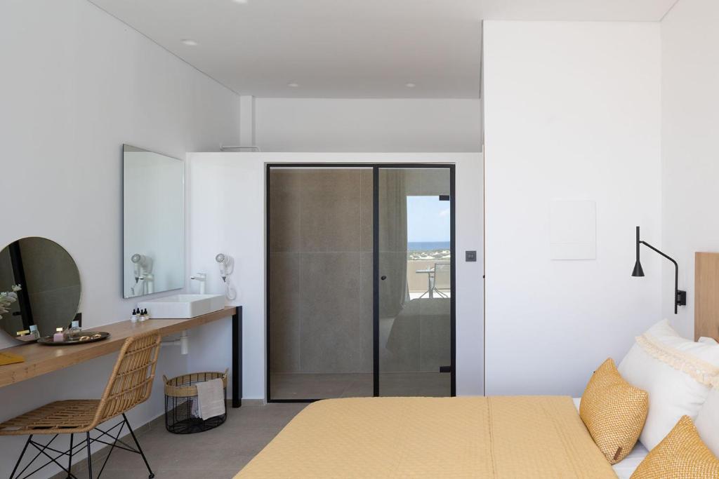 Postel nebo postele na pokoji v ubytování Olive Vista Suites