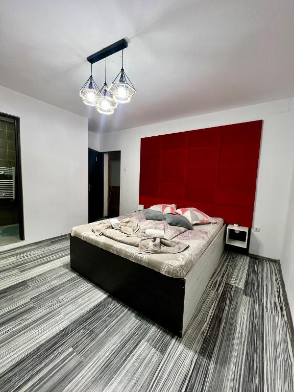 Postel nebo postele na pokoji v ubytování Aigi Rooms Vila