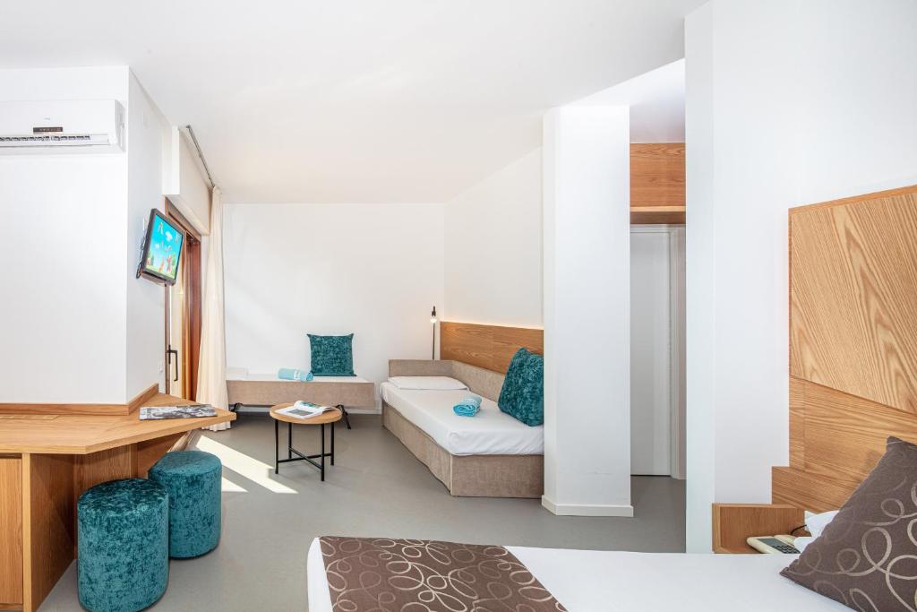 Postel nebo postele na pokoji v ubytování Hotel Atlantic