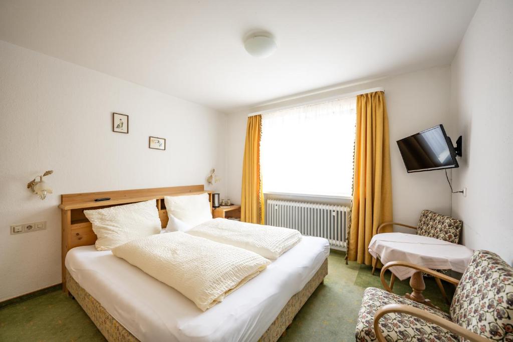 Postel nebo postele na pokoji v ubytování Haus Widdersteinblick