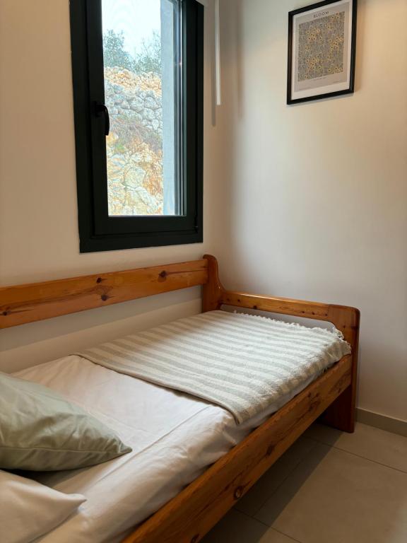 Postel nebo postele na pokoji v ubytování Anemar Lefkada