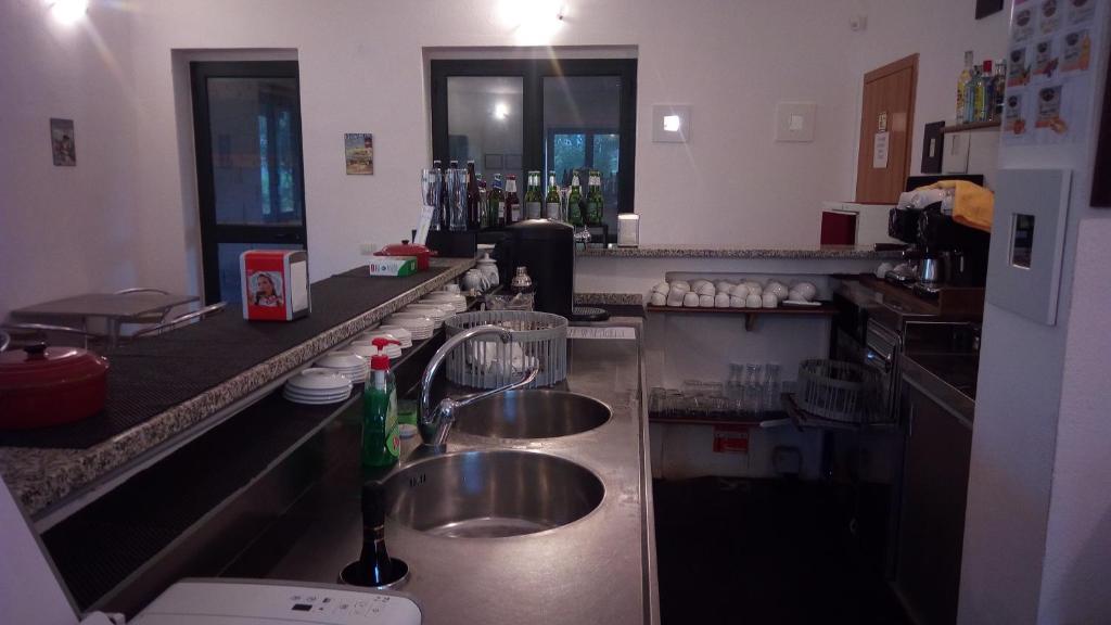 Kuchyň nebo kuchyňský kout v ubytování Nuraghe Ruiu Villaggio Tende Attrezzate