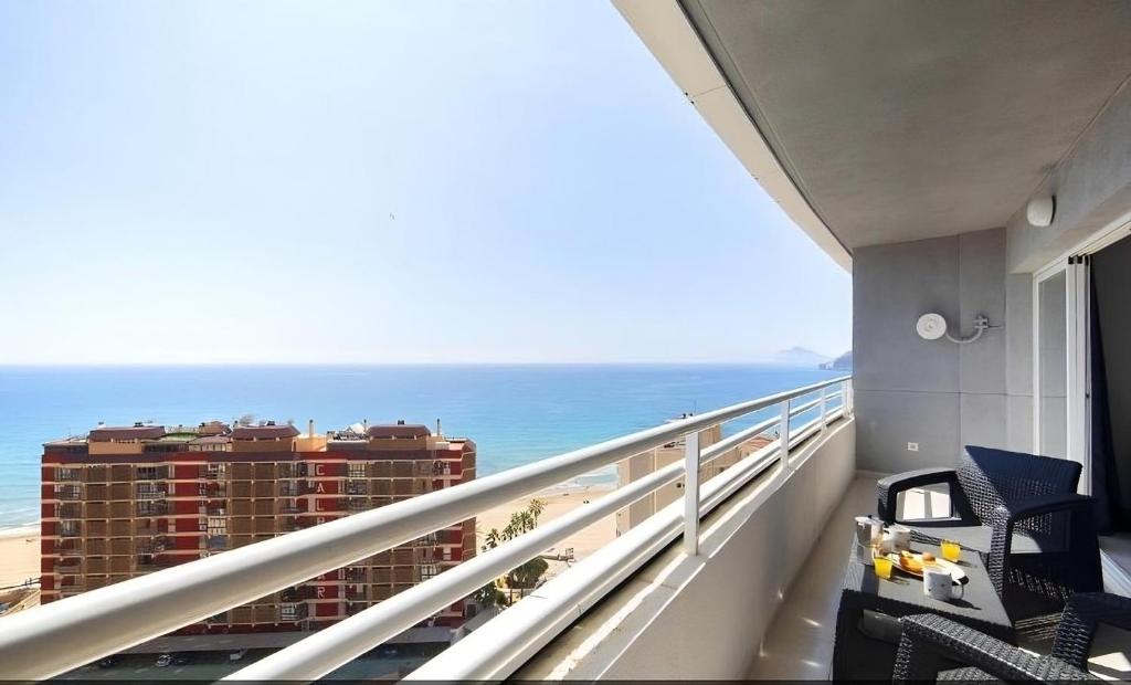 a balcony with a view of the ocean at Homeincalpe Apolo XIV in Calpe