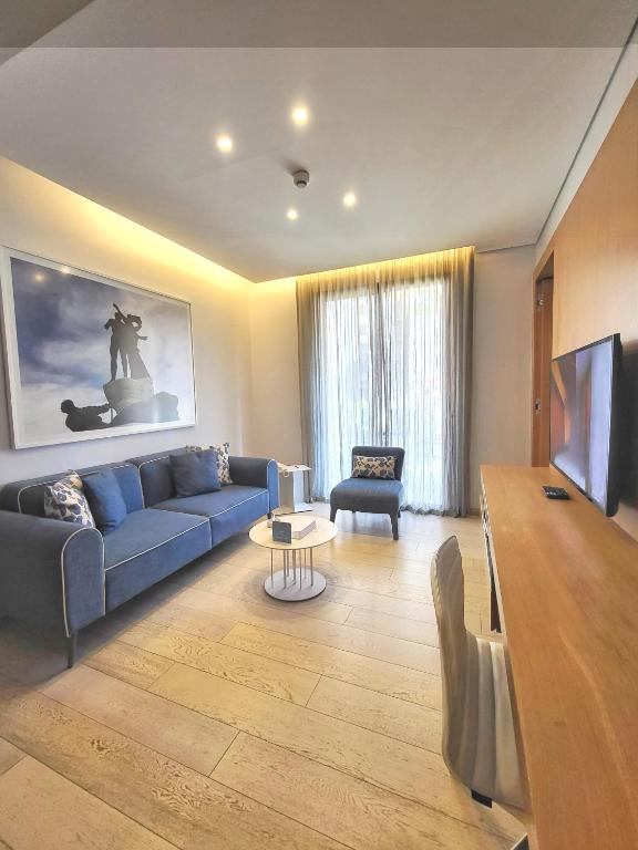 TV a/nebo společenská místnost v ubytování Monot Suites