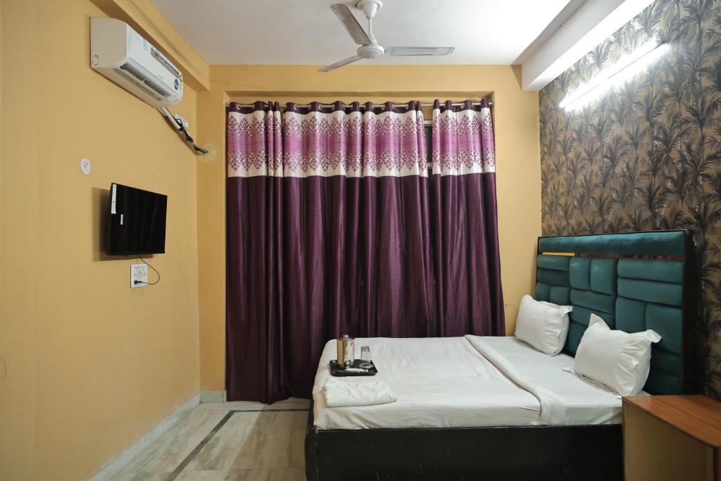 Postelja oz. postelje v sobi nastanitve Private rooms in near Laxmi Nagar