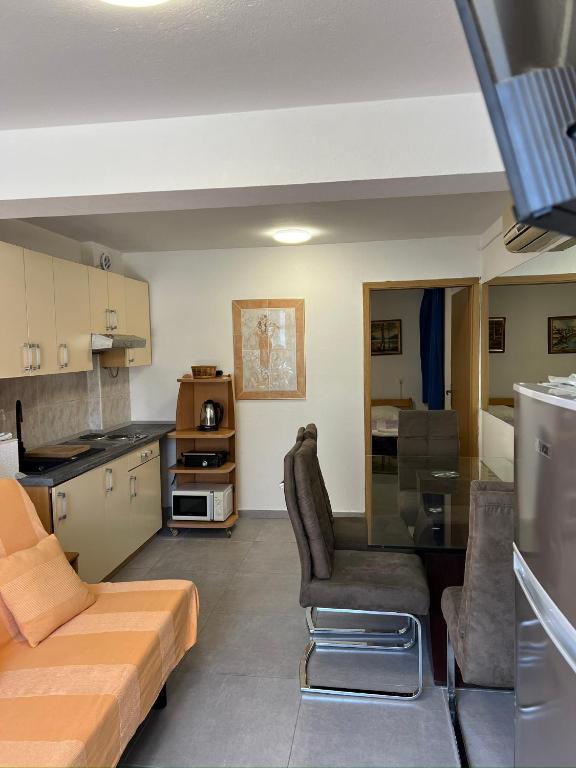 Kuchnia lub aneks kuchenny w obiekcie Rooms & Apartment Hegic