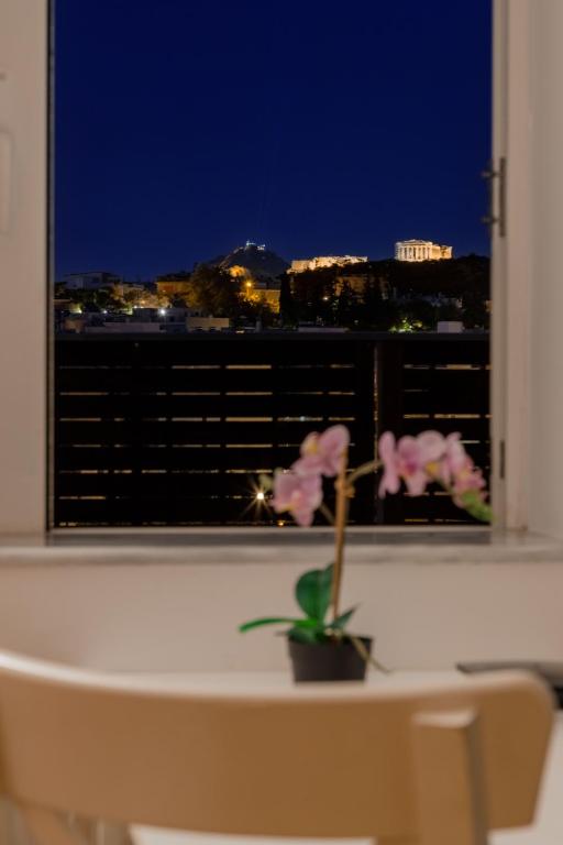 A balcony or terrace at The Terrace with Acropolis & Athens view