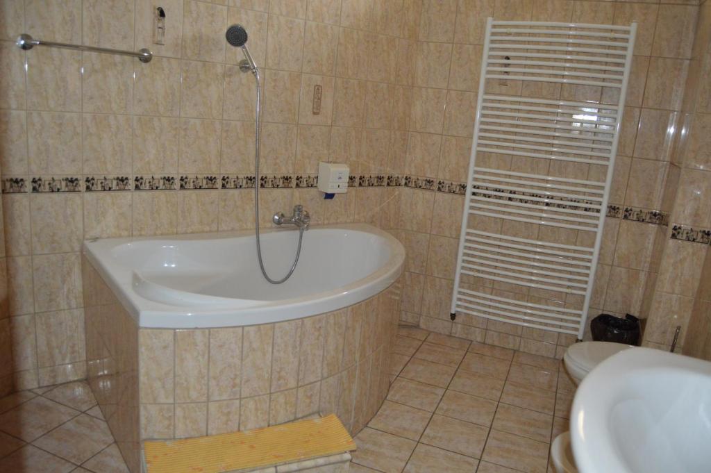 Koupelna v ubytování Hotel Paradise
